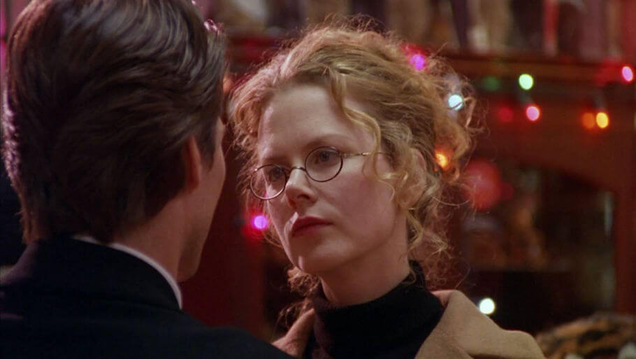 This image shows Nicole Kidman as Alice Harford alongside Tom Cruise in the final scene of Stanley Kubrick's 1999 psychological drama film Eyes Wide.