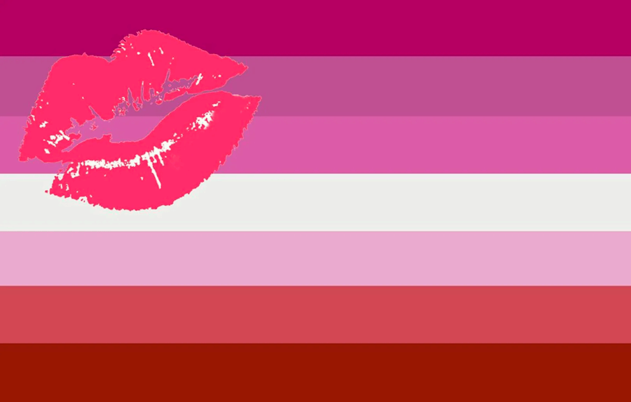 Image of the Lipstick Lesbian Flag designed in 2010 by Natalie McCray featuring six shades of pink and red stripes, one white one in the middle, and a red kiss overlay.